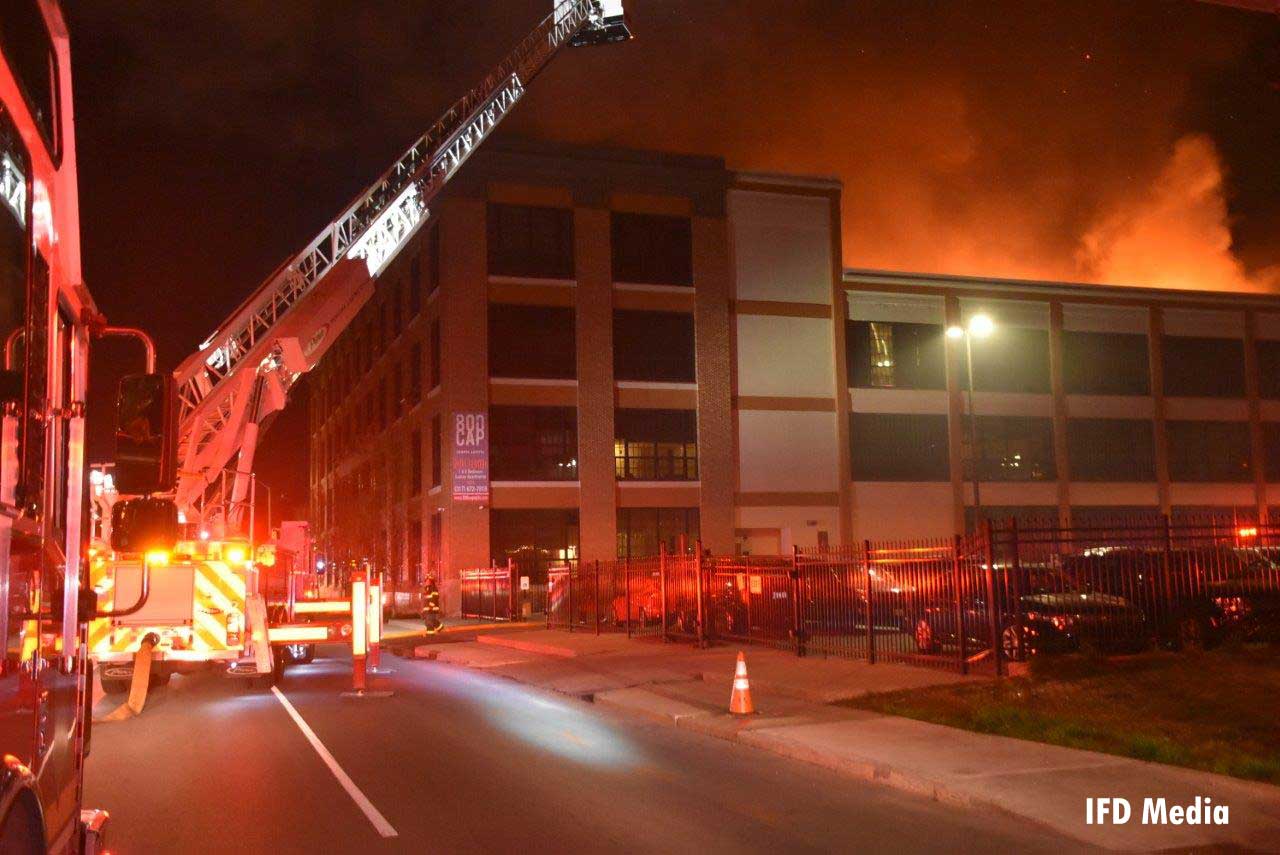 Aerial device trains stream on roof fire