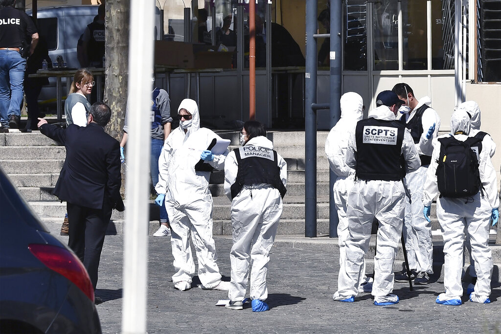 Responders in full PPE at scene of mass stabbing in France