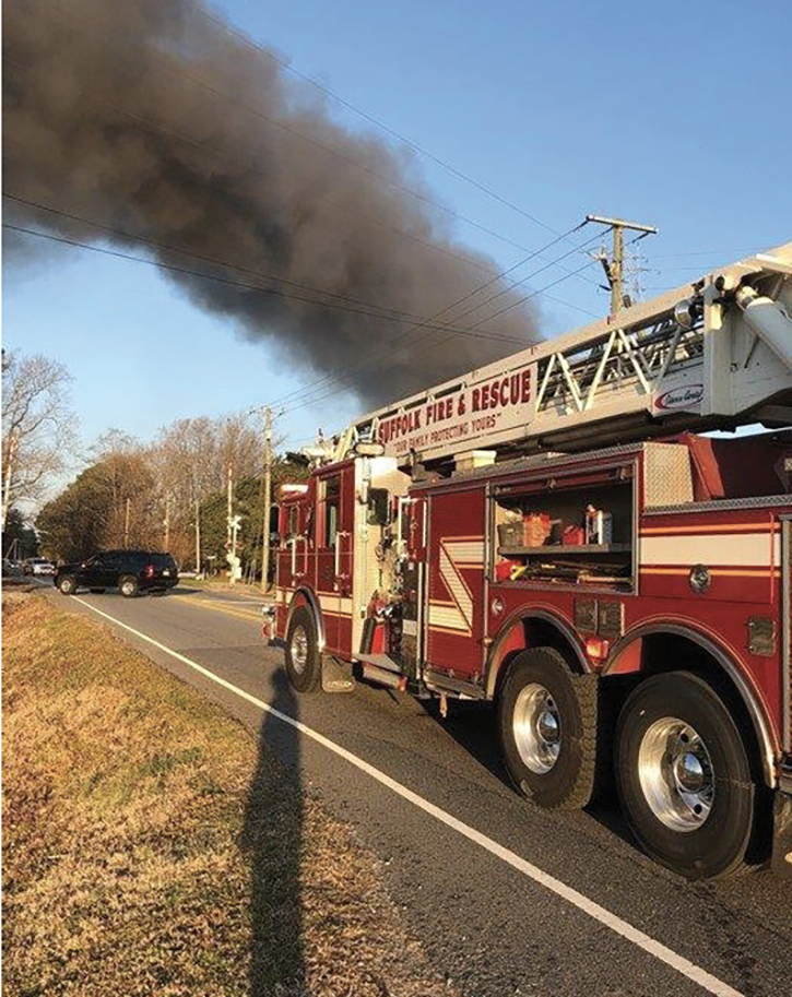 A motorist notified 911 when he saw a large smoke column in the area. Because of the distance off the road, first-arriving units were unsure of what was on fire until they made their way down a long dirt road.