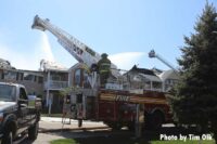 More images of tower ladders working at the apartment fire