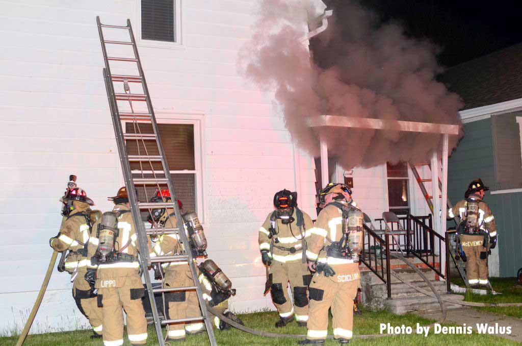 Firefighters working at a dwelling fire in Royal Oak, Michigan