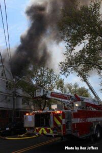 Smoke rises from the multifamily dwelling in Bayonne