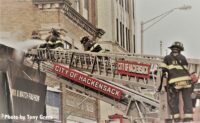 Hackensack firefighters on an aerial device