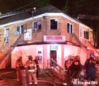 Exterior of the building as firefighters work