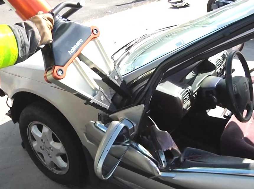 Extrication tool used on hinges of a car door