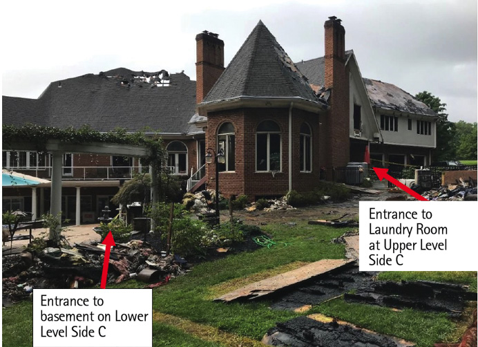 The down nozzle firefighter had entered through the upper side C laundry room entry on the first floor and fell through the floor into the basement crawl space. The RIT entered through the lower side C basement entrance and up the stairs to the crawl space. There, they found the down firefighter and removed him by the same route.