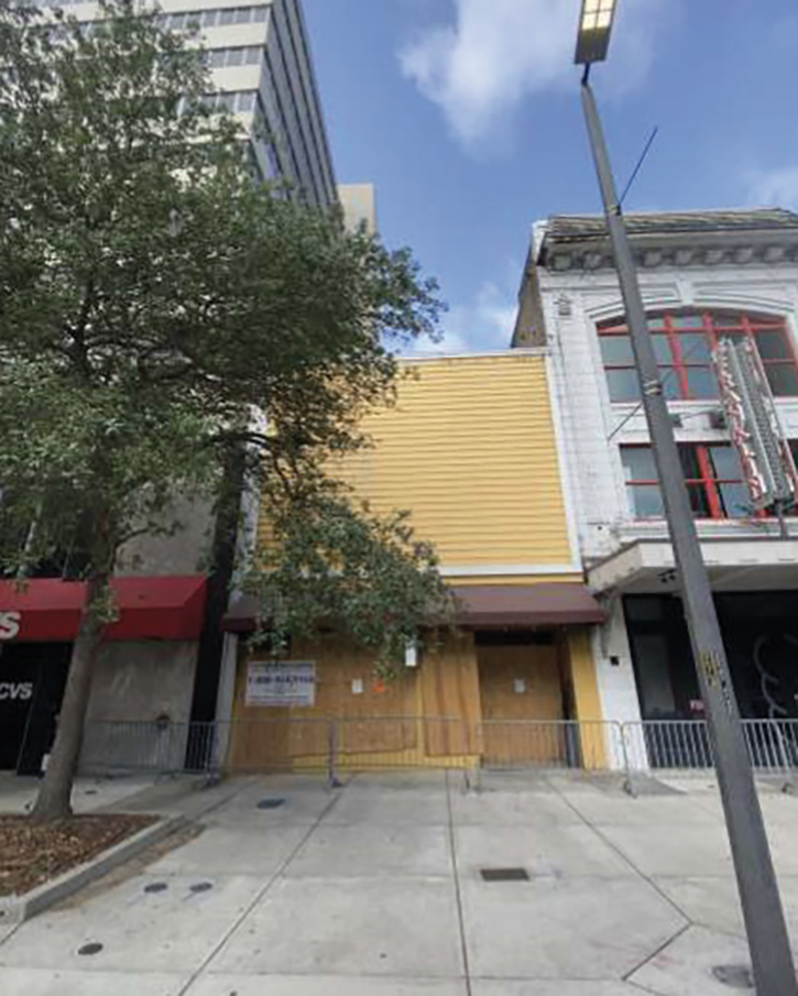 The Franklin Street fire building and the B and D exposures. The covered windows on the A side were not evident until the next day. 