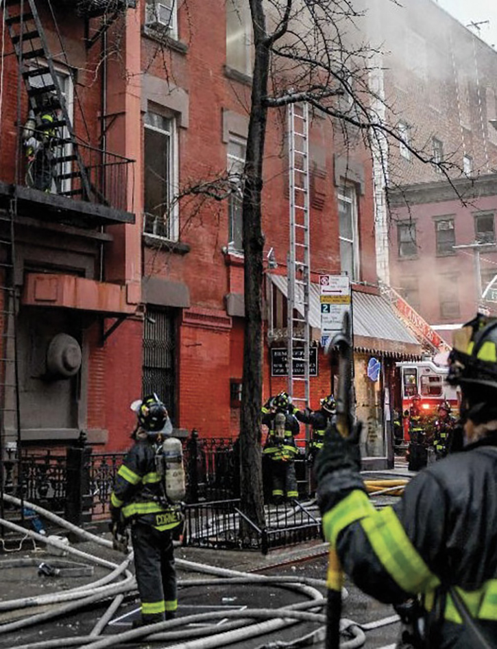 Ground ladders were positioned to provide firefighter egress as fire conditions intensified. 