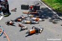 An array of extrication tools at the scene of the motor vehicle accident