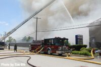 Fire apparatus working during a three-alarm fire in South Holland, Illinois