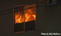 Flames reflect in windows