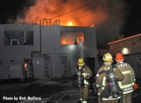 Flames rage from the top of a building in L.A.