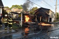 Another view of flames coming from the burned out garage in Indianapolis