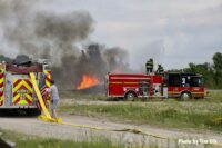 Fire apparatus at the scene of a rubbish fire in Iowa