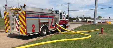 Supply lines run into pumper