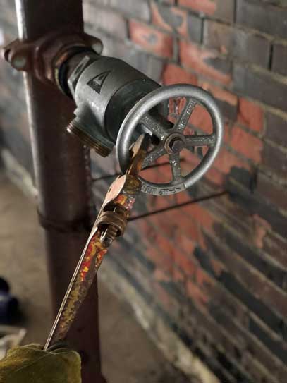 Pipe wrench on standpipe