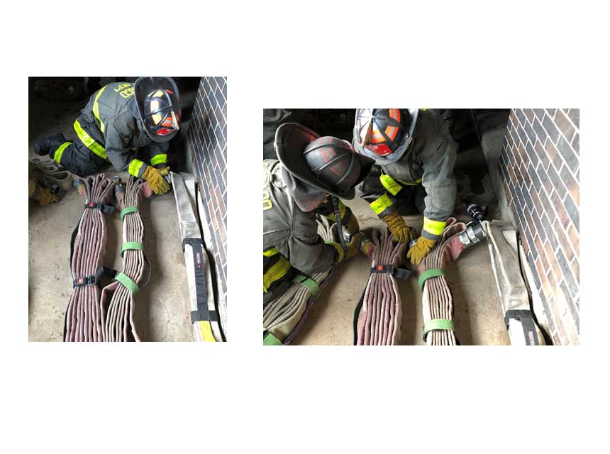 Firefighters dealing with hose packs