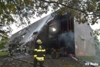 A view of firefighters and damage to the Pickwick Farms Apartments