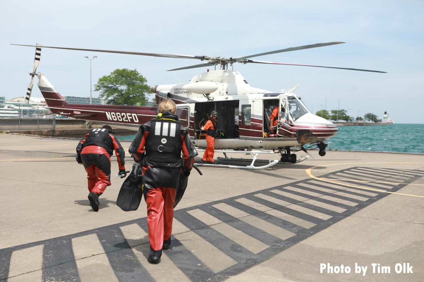 Chicago Fire Department dive team members head to helicopter