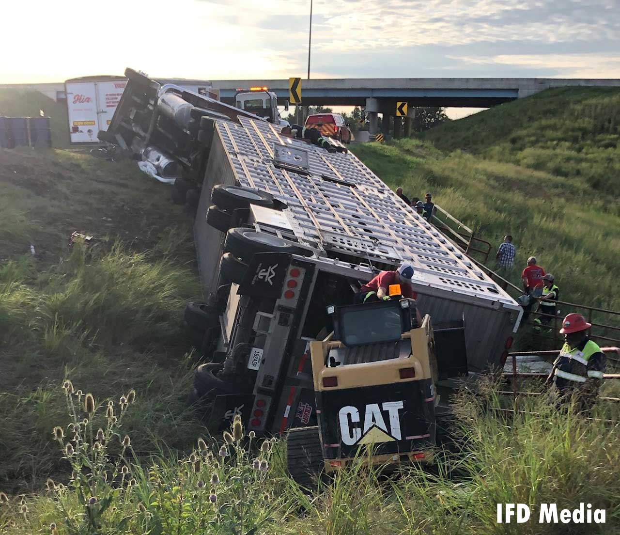 Indianapolis firefighters at scene of overturned cattle trailer