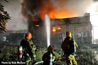 LAFD control a hoseline on the exterior of the fire