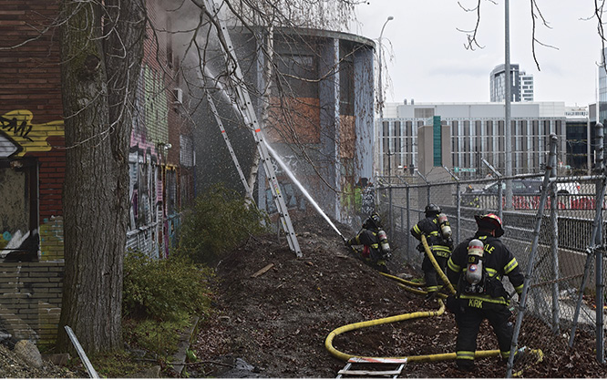 The C side was blocked by fencing and a drop-off to a highway below the overpass.