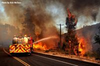 Fire apparatus battling wildfire