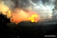 Flames rage across the landscape