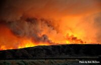 Scorched landscape with flames