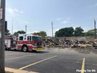 Fire apparatus in front of ruins of building in Kenosha