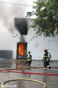 Kenosha firefighters control flames in the wake of riots in the city