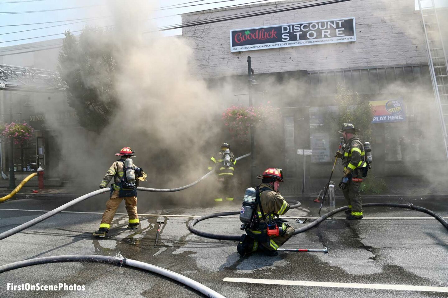 Smoke envelopes firefighters at Mineola fire