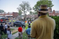 People gather outside an explosion in Baltimore