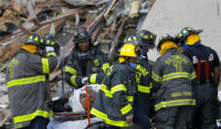 Baltimore City Fire Department carries a person out