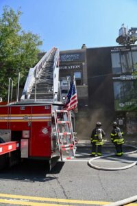 View of FDNY ladder set up to top of building