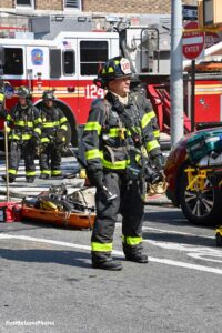 An FDNY firefighter on scene at the fire in Queens