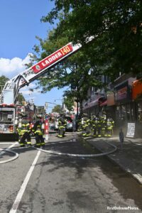 FDNY ladder truck at the scene of a fire in Queens