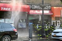 Water spray and firefighters on the fireground