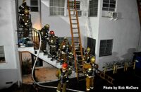 Laddered building and LAFD firefighters