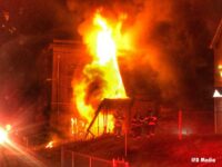 Flames tear through a building in Indianapolis