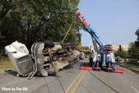 The tanker truck is righted