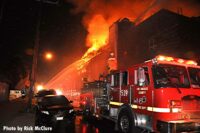 Firefighters working at the huge fire