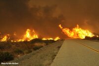 Flames and smoke from the Bobcat Fire