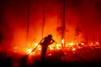 Firefighter battling a 2020 wildfire in California