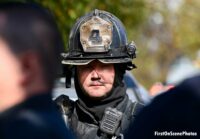 Firefighter at the scene of a fire in Queens, NY