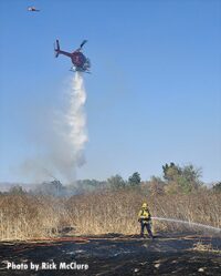 Copter makes drop on L.A. vegetation fire