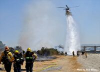 Helicopter drop on vegetation fire in Los Angeles