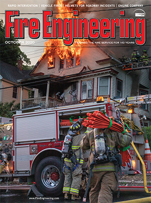 Firefighters work at the scene of a fire in Waterbury, Connecticut