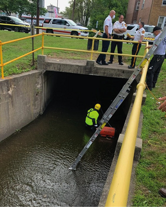 The Main Avenue/Benson Court opening, where the vehicle entered the drainage system.