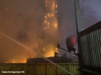 Fire at a three-alarm fire in the Dorchester section of Boston, Massachusetts